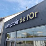 Goudwisselkantoor naam bord gevel